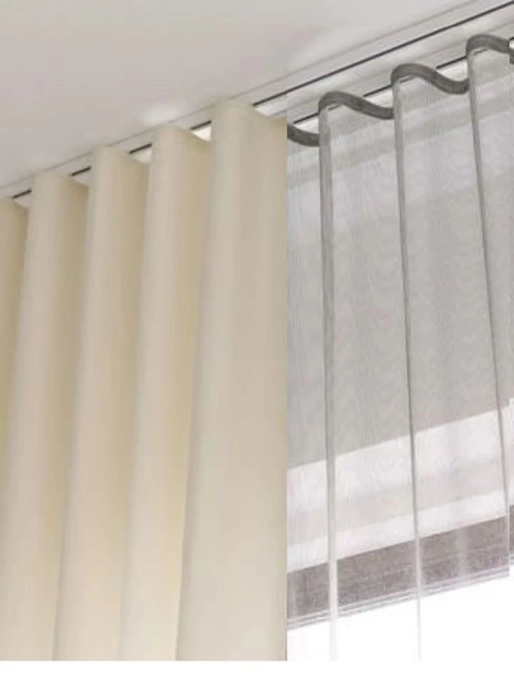 curtain styles 2026 showing ripple fold curtains installed on ceiling tracks