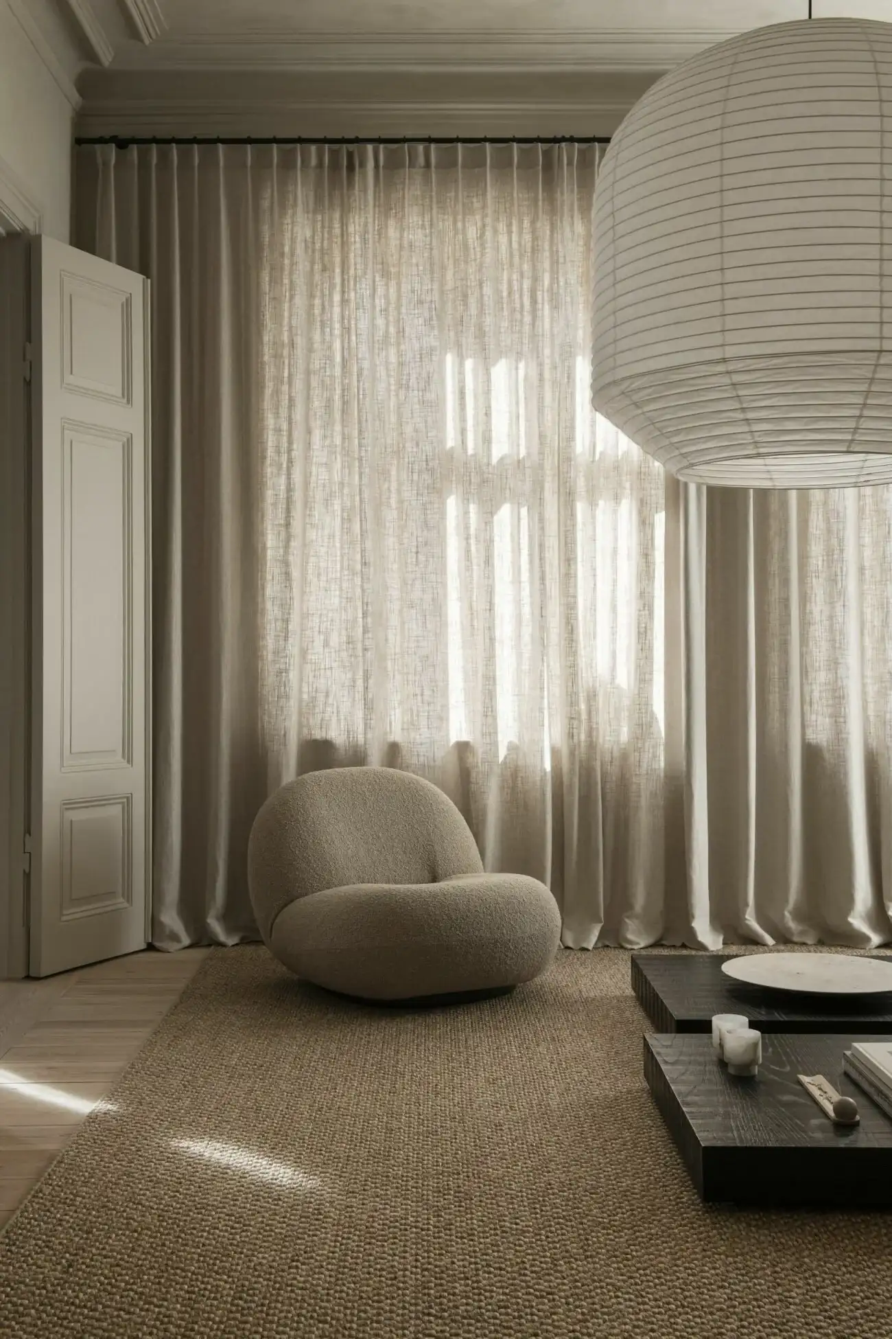 curtain styles 2026 with soft neutral sheer curtains in a modern living room