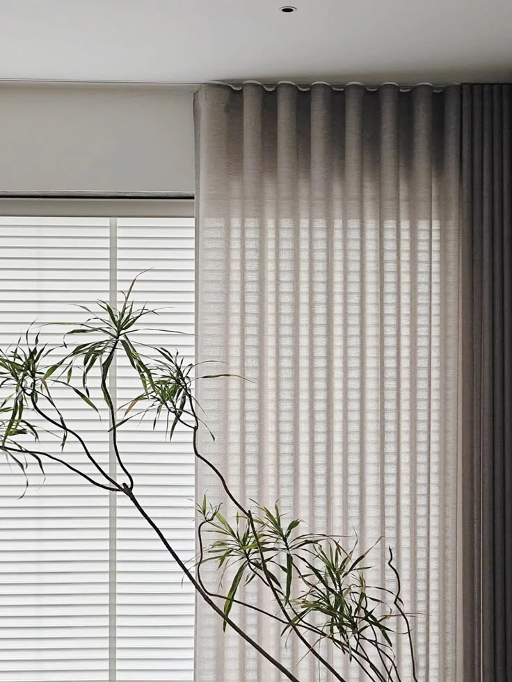 curtain styles 2026 featuring wave fold curtains with smooth uniform pleats