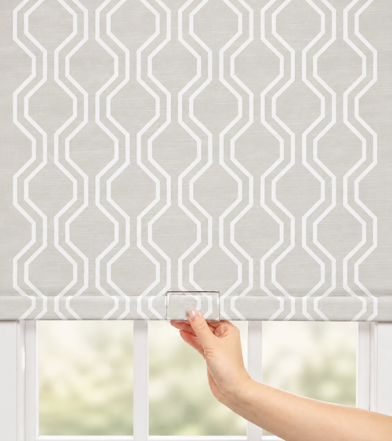No-drill waterproof roller shades being adjusted with a transparent lift handle